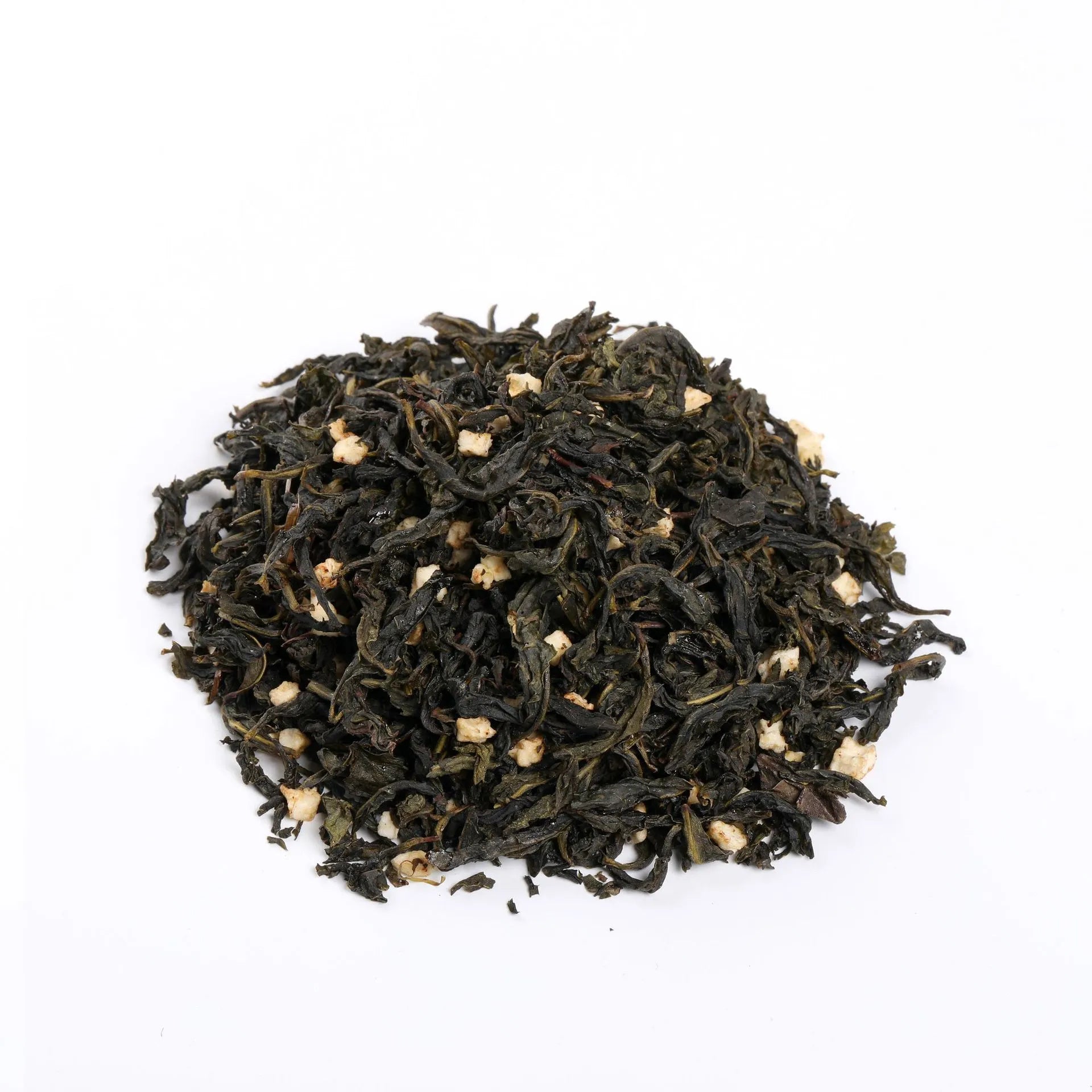 Close-up of premium loose leaf passion fruit oolong tea with dried fruit bits on a white background.