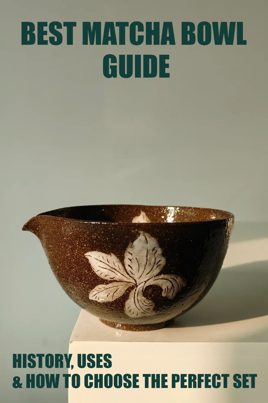 Brown ceramic matcha bowl with white floral patterns — visual guide to matcha bowl history, uses, and choosing the perfect set.